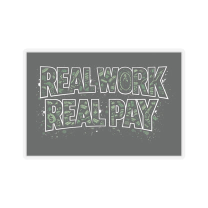Motivational sticker with 'Real Work Real Pay' text on a gray background